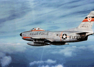 Note the natural metal finish and how colorful USAF planes were at one time. The Red Line is a turbine warning stripe... donât stand there because if the engine fails thatâs the most dangerous part of the aircraft.Â